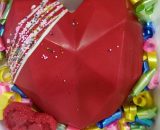 Red heart shape PINATA cake beautifully decorated